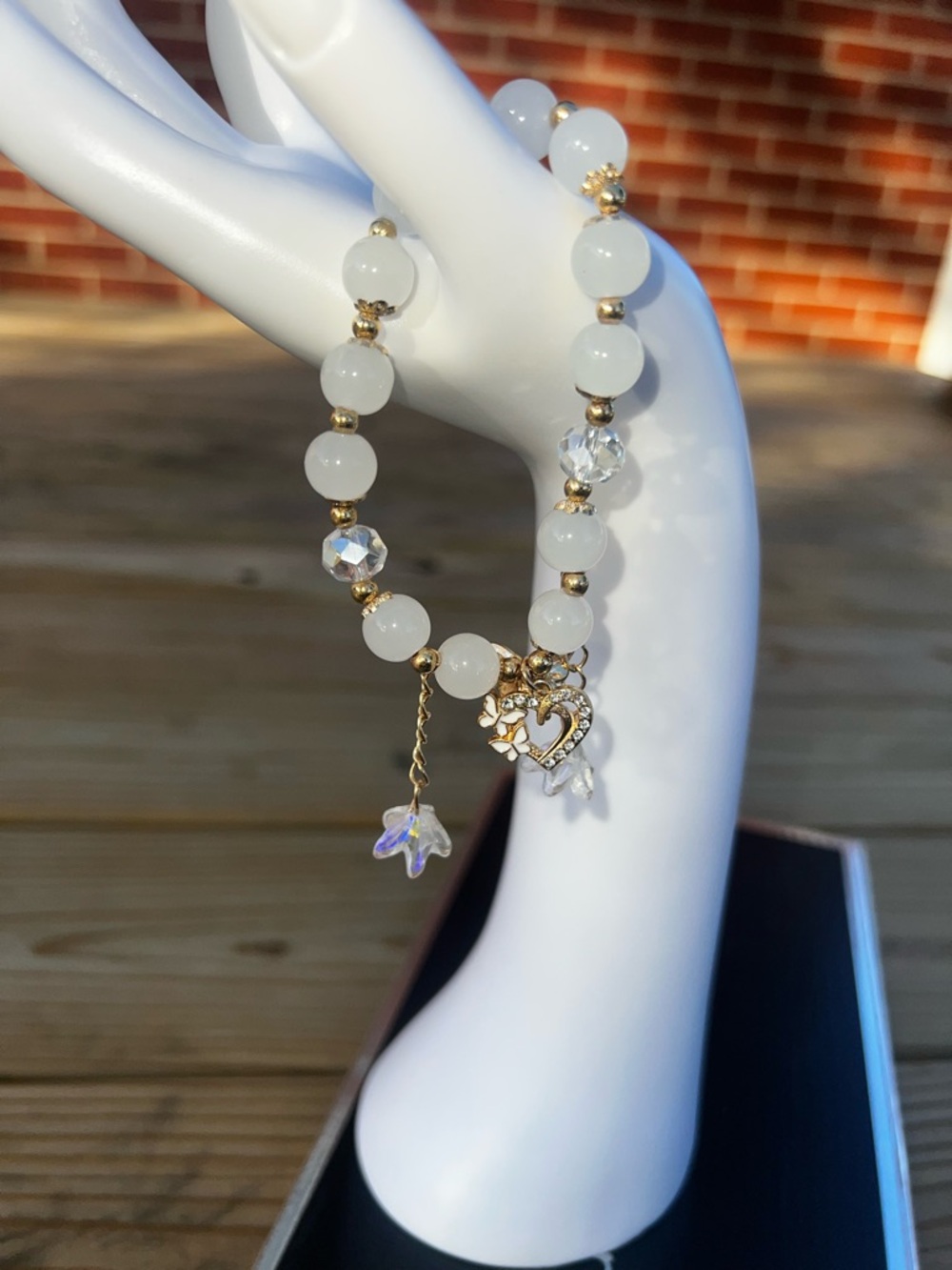 White Beaded Gold Accent Bracelet with Heart & Iridescent Flower Charm